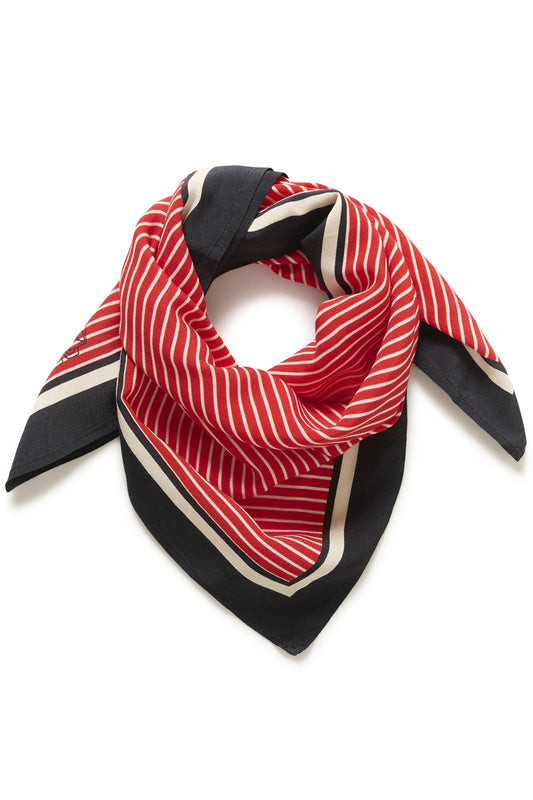 Red and black striped scarf on a white background