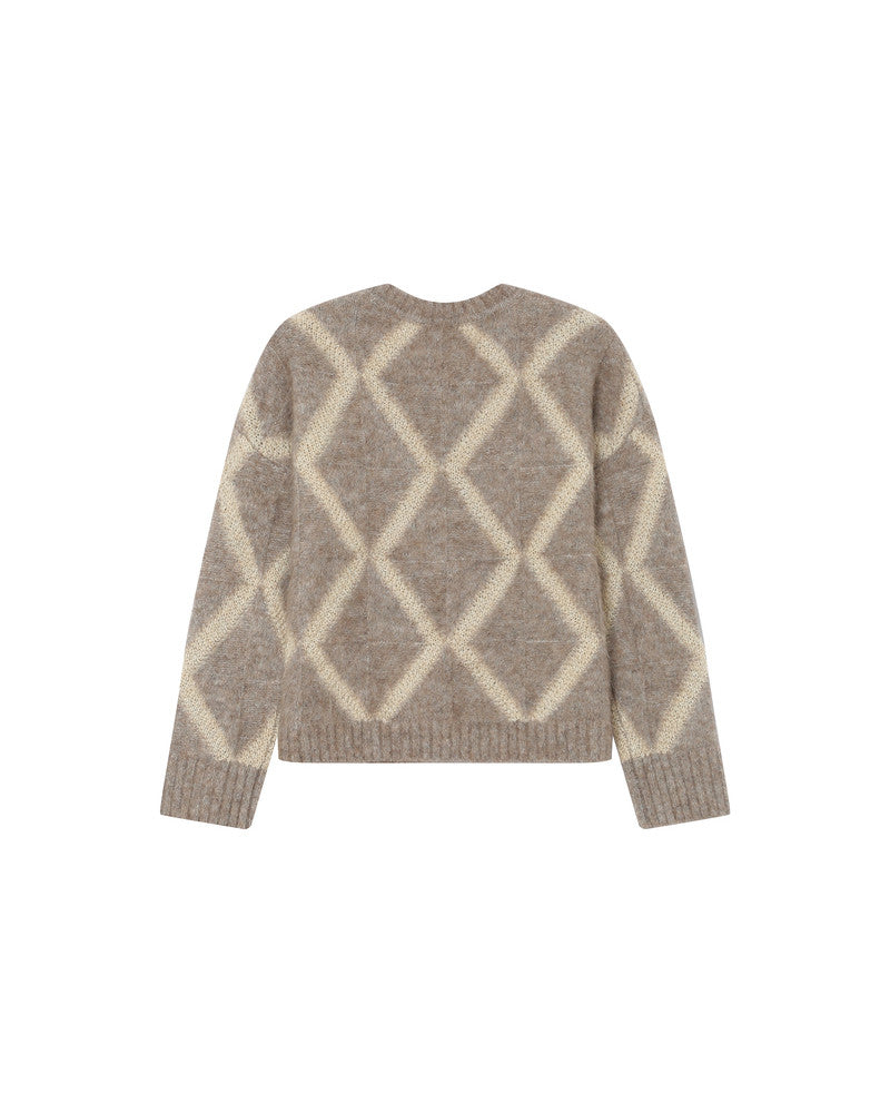 Brown and beige patterned sweater on a white background