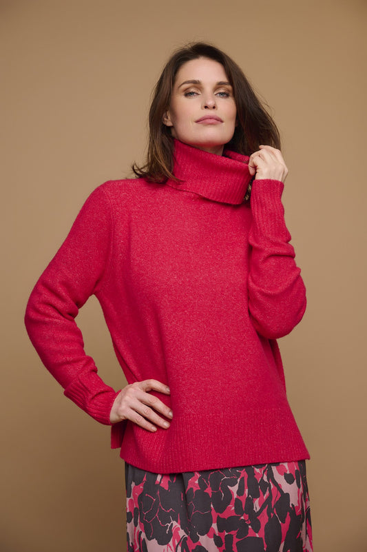 rino & pelle oversized turtleneck sweater and feel the soft, cozy comfort! The stylish design includes ribbed details at the sleeves and hem and side slits that add a special something. The fuschia pink colour is stunning! lemon cyprus boutique