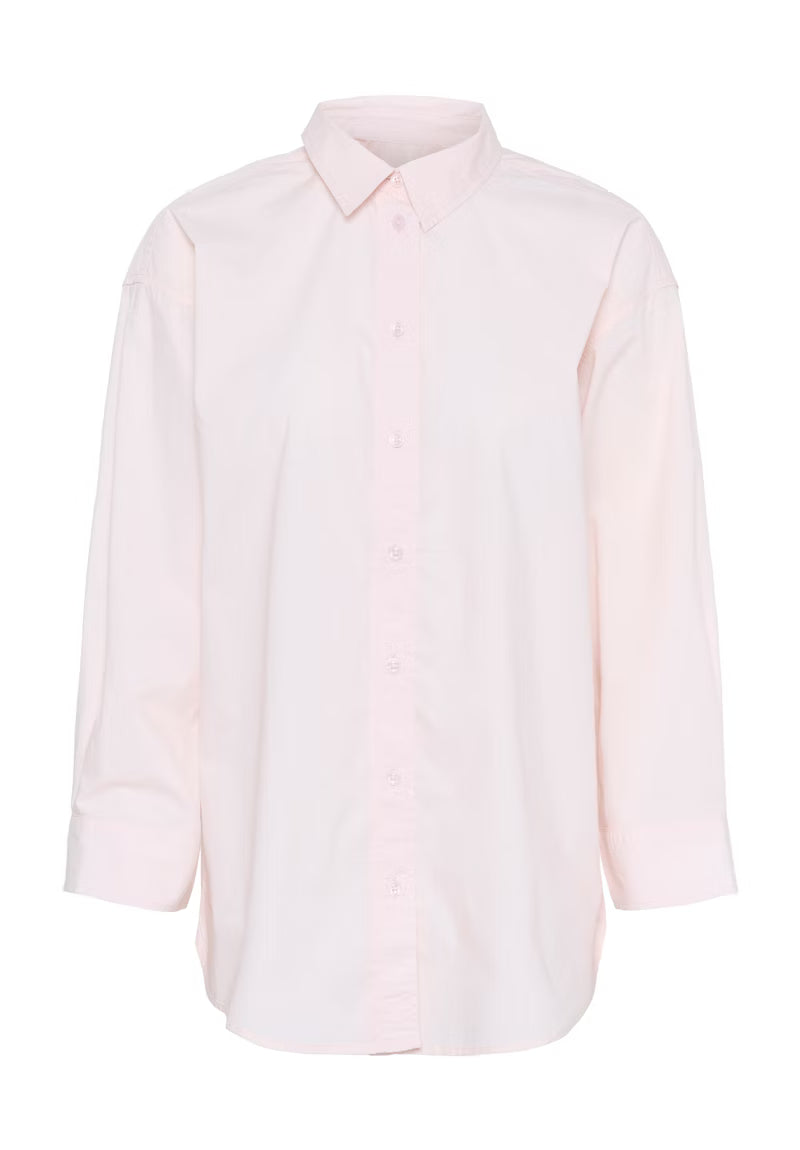 Light pink shirt on a white background