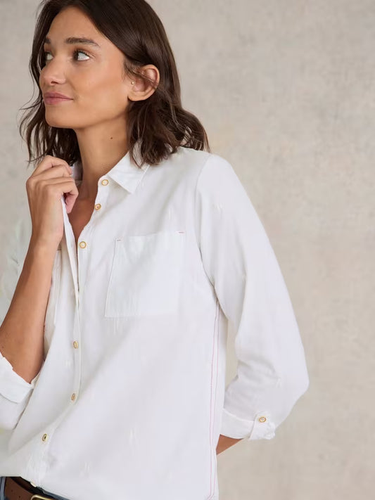 Meet the Sophie Organic Cotton Shirt by White Stuff in a soft pale ivory shade. With its playful contrast embroidery, this shirt is the fresh boost your button-up collection has been craving.