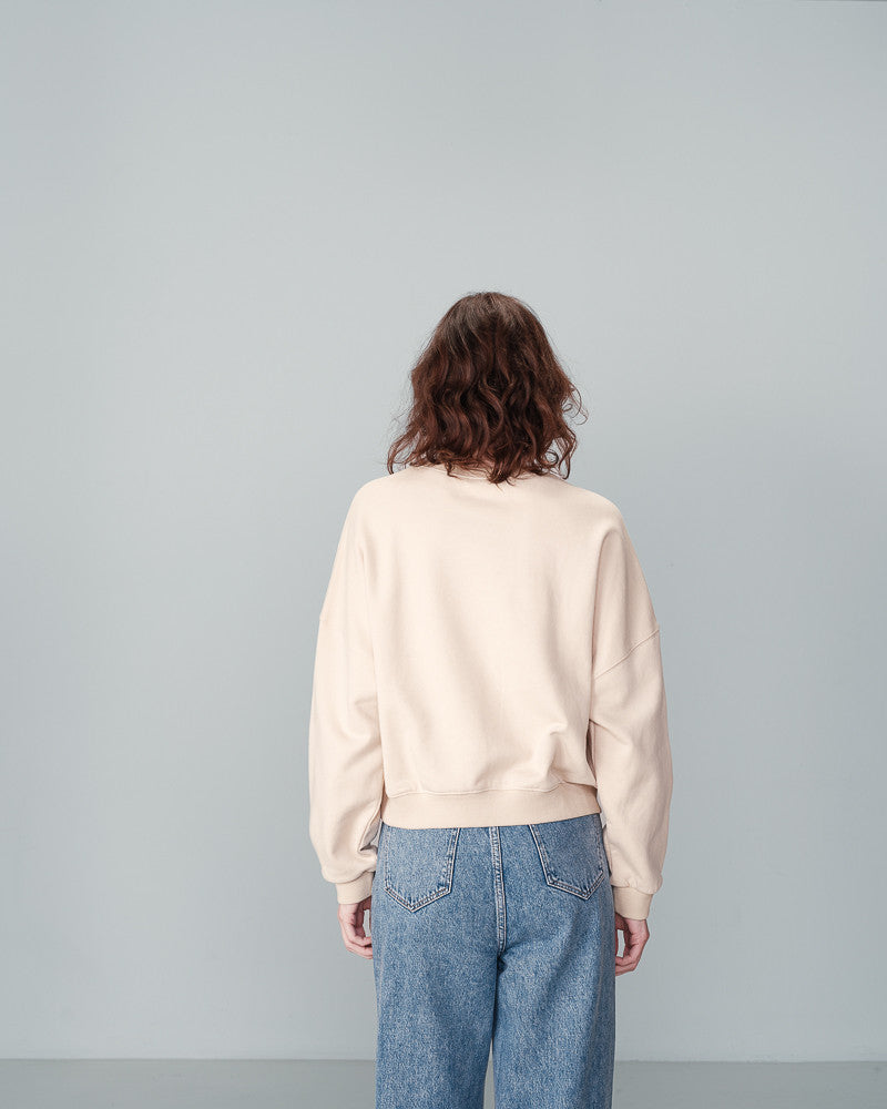 The&nbsp;NIGEL round neck sweatshirt by Grace &amp; Mila&nbsp;has a 'LOVELY' velvet print message in a beautiful hunter green on beige. Made from natural fibres, the warm and comfy&nbsp;NIGEL message sweater&nbsp;is a fall/winter essential. lemon cyprus boutique