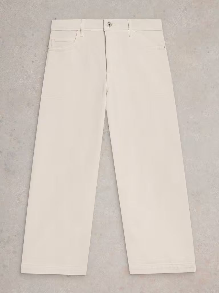 Beige pants on a gray background