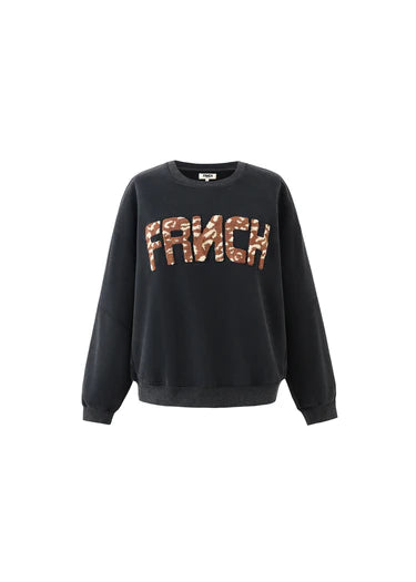 Black sweatshirt with 'FRANCK' text in leopard print on a white background