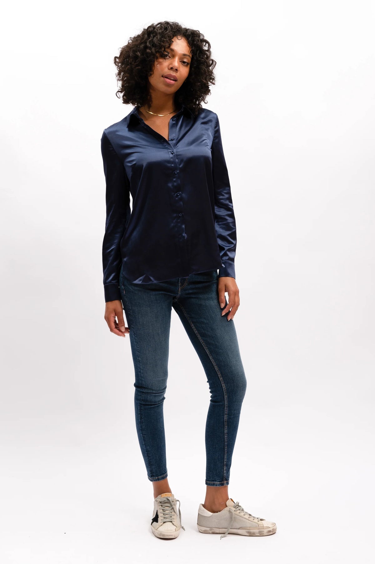 This rich midnight coloured Carmen shirt by We Are The Others is crafted for a lasting, polished look. Featuring our core Satin shirt fit, self-covered button detail at center front & cuff openings, and a shaped hem, this shirt guarantees a smart, sophisticated style. Embodying modern and timeless elements, this design offers an updated take on a classic look. lemon cyprus boutique