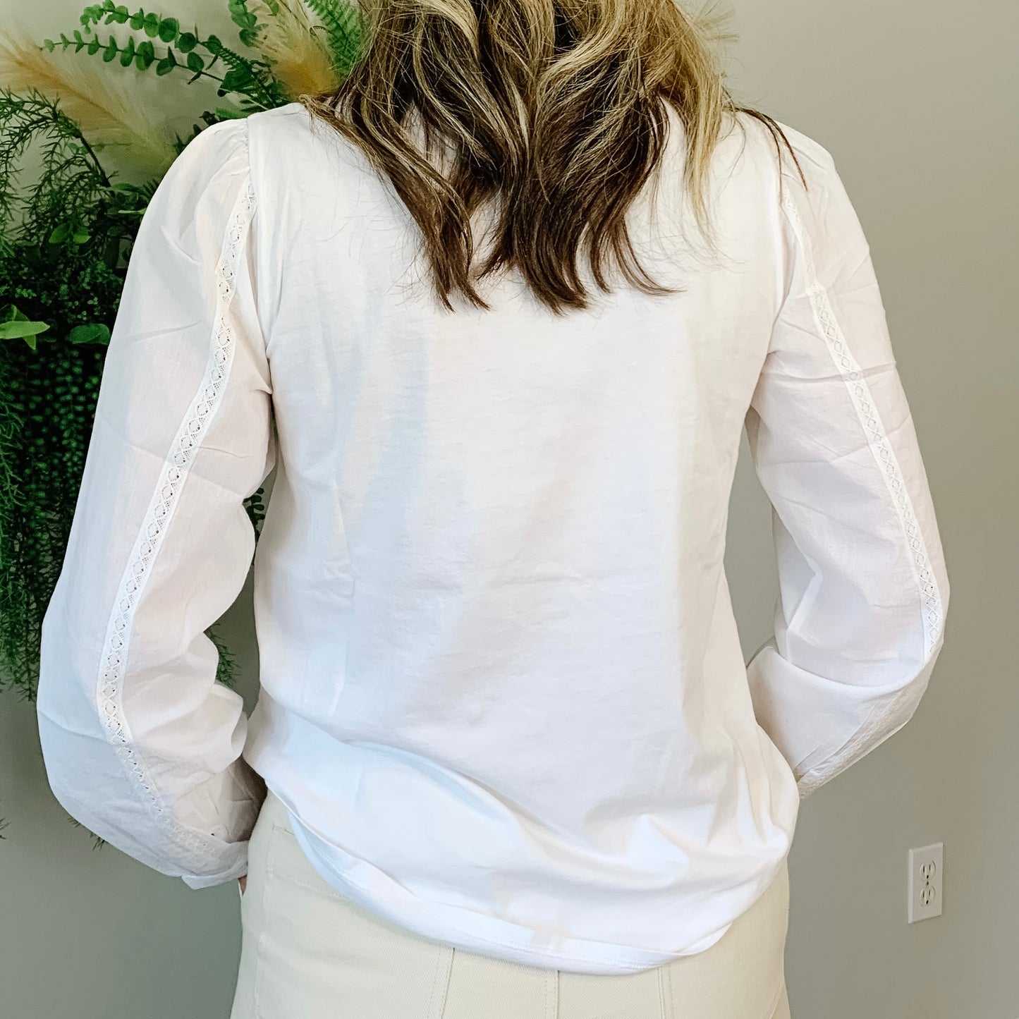 100% cotton white blouse. The scalloped detailing on the collar with the intricate and pleating details that run vertically down the front and arms of the blouse are stunning.