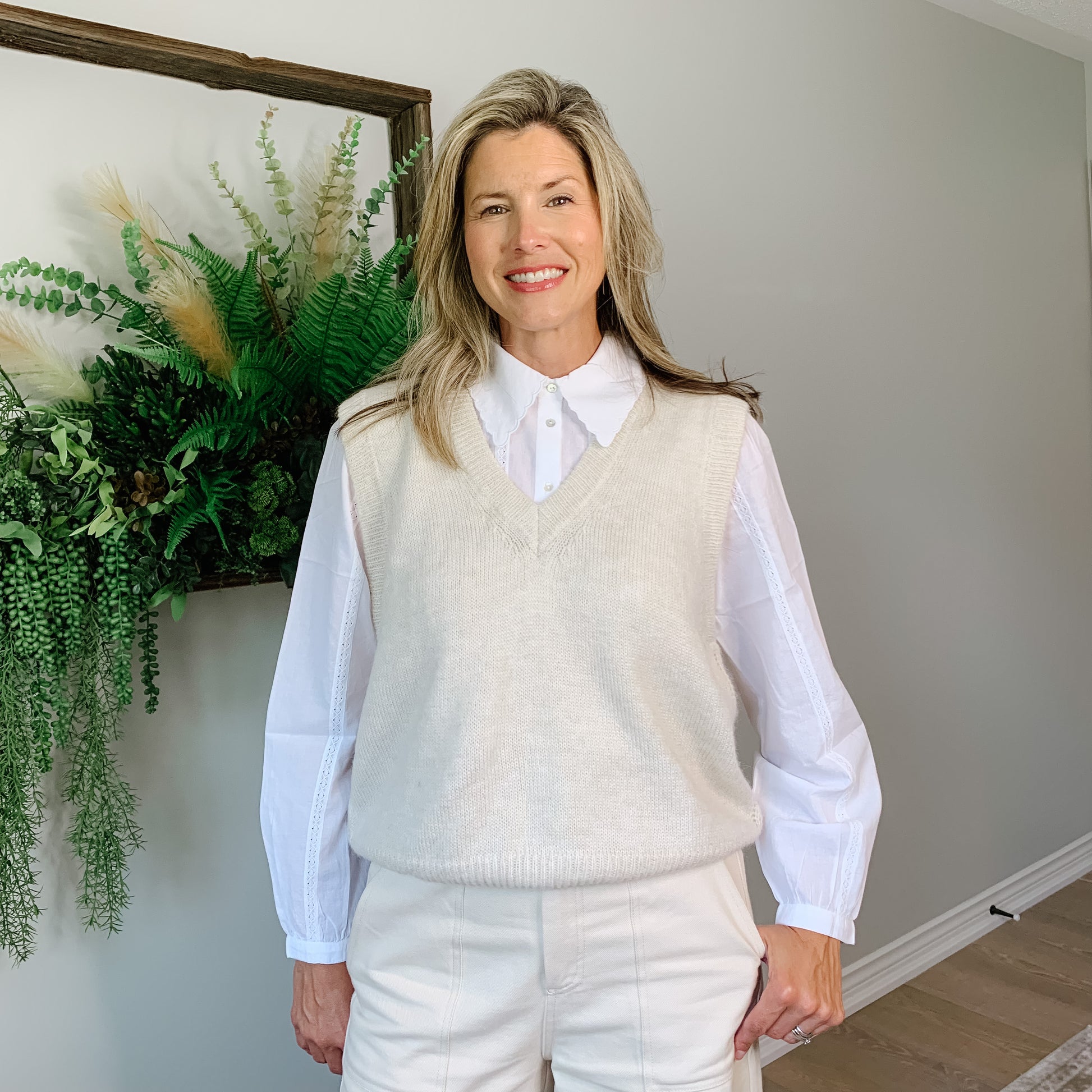 100% cotton white blouse. The scalloped detailing on the collar with the intricate and pleating details that run vertically down the front and arms of the blouse are stunning.